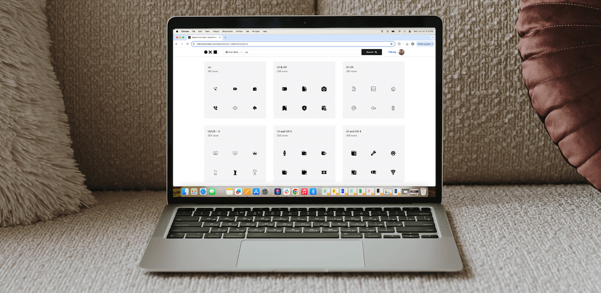 A laptop with Noun Project, the best website to download free icons for your website